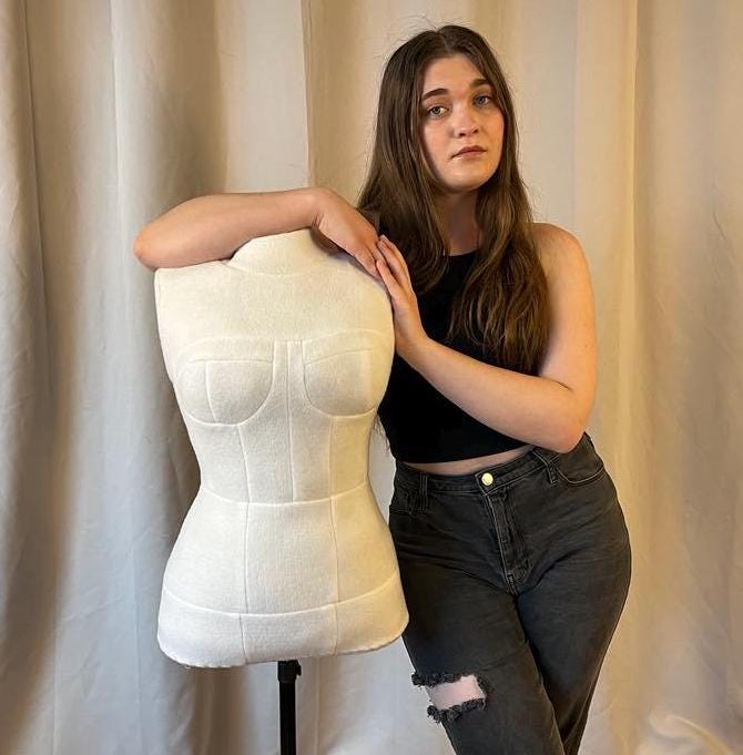 Full view with model next to Armless Custom Dress Form from 3D body scan